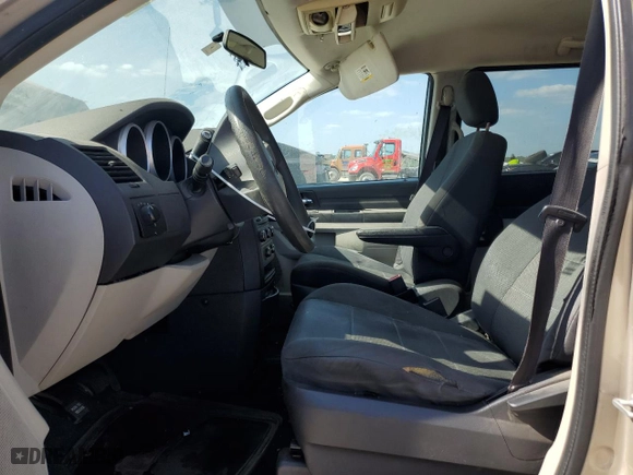 2009 Dodge Grand Caravan SE with VIN 2D8HN44E49R585395, listed as a Copart auction lot 52908795 with 304,111 mi miles and Salvage Title. Bid and sale history available at carsss.com. Image 7.
