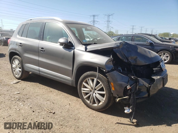 2013 Volkswagen Tiguan SE with VIN WVGAV7AX7DW018388, listed as a Copart auction lot 56188045 with 98,066 mi miles and Salvage title. Bid and sale history available at DreamBid. Image 4.