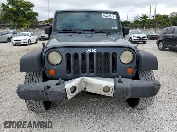 2007 Jeep Wrangler Unlimited X with VIN 1J8GA39107L105101, listed as a Copart auction lot 88559675 with 213,902 mi miles and Salvage title. Bid and sale history available at DreamBid. Image 5.