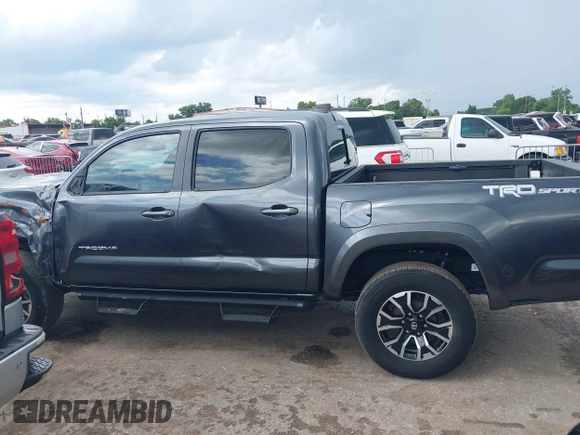 2022 Toyota Tacoma SR5 with VIN 3TMAZ5CN6NM186713, listed as a IAAI auction lot 42607719 with 60,704 mi miles and . Bid and sale history available at DreamBid. Image 14.