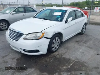 2014 Chrysler 200 LX with VIN 1C3CCBAB4EN141555, listed as a IAAI auction lot 41903899 with 242,673 mi miles. Bid and sale history available at carsss.com. Image 2.