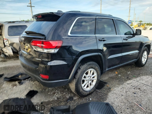 2020 Jeep Grand Cherokee Laredo E with VIN 1C4RJEAG7LC113542, listed as a Copart auction lot 62715585 with 64,124 mi miles and Salvage title. Bid and sale history available at DreamBid. Image 3.