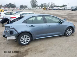 2023 Toyota Corolla Hybrid LE with VIN JTDBCMFE8PJ013271, listed as a IAAI auction lot 42099797 with 14,080 mi miles and . Bid and sale history available at carsss.com. Image 14.