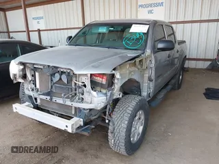 2014 Toyota Tacoma with VIN 3TMLU4EN3EM162738, listed as a IAAI auction lot 41871226 with 135,318 mi miles and . Bid and sale history available at DreamBid. Image 2.