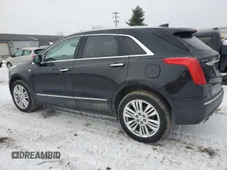 2019 Cadillac XT5 Premium Luxury AWD z VIN 1GYKNFRS1KZ114339, wystawiony jako Copart lot #44032245 z przebiegiem 77 484 mil mil oraz Czysty tytuł • Clean title. Historia ofert i sprzedaży dostępna na DreamBid. Obrazek 2.
