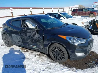 2017 Hyundai Veloster with VIN KMHTC6AD6HU323512, listed as a IAAI auction lot 41572208 with 92,086 mi miles. Bid and sale history available at carsss.com. Image 1.