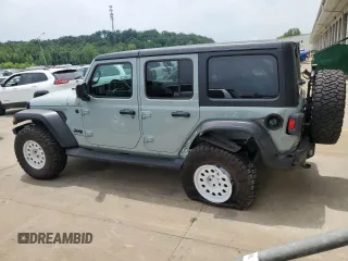 2023 Jeep Wrangler Sport with VIN 1C4HJXDN0PW643485, listed as a Copart auction lot 59783564 with 14,001 mi miles and Salvage Title. Bid and sale history available at DreamBid. Image 2.