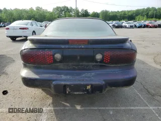 1999 Pontiac Firebird Firebird with VIN 2G2FS22K4X2202867, listed as a Copart auction lot 54529755 with Not provided miles and Salvage title. Bid and sale history available at DreamBid. Image 6.
