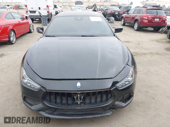 2021 Maserati Ghibli S with VIN ZAM57YSA3M1365483, listed as a IAAI auction lot 42562390 with 51,954 mi miles and . Bid and sale history available at DreamBid. Image 13.