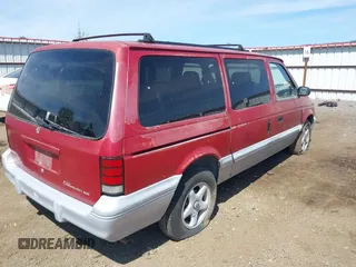 1994 Dodge Caravan Grand SE z VIN 1B4GH4432RX349830, wystawiony jako IAAI lot #42217968 z przebiegiem 161 577 mil mil oraz . Historia ofert i sprzedaży dostępna na DreamBid. Obrazek 4.
