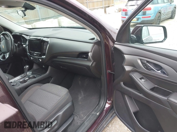 2018 Chevrolet Traverse LT Cloth z VIN 1GNERGKW2JJ282845, wystawiony jako IAAI lot #41990694 z przebiegiem 101 659 mil mil oraz . Historia ofert i sprzedaży dostępna na DreamBid. Obrazek 5.