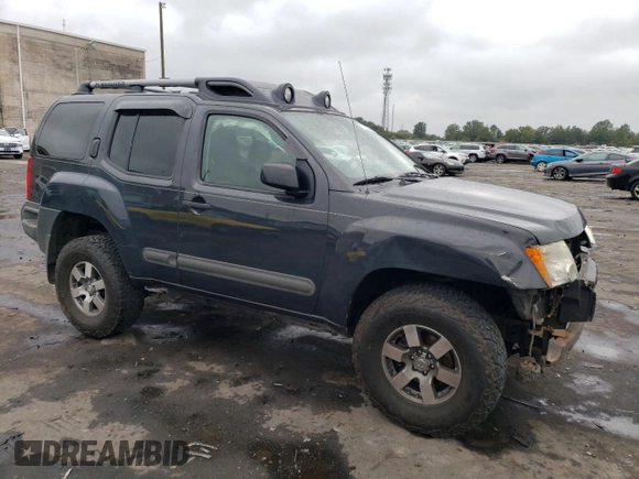 2012 Nissan Xterra X with VIN 5N1AN0NW0CC503500, listed as a Copart auction lot 71752364 with 139,892 mi miles and Salvage Title. Bid and sale history available at DreamBid. Image 4.