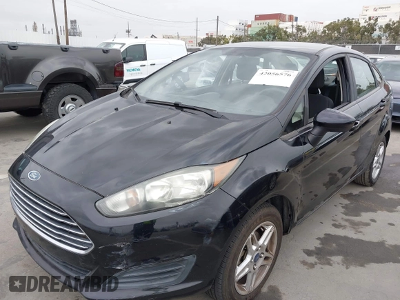 2017 Ford Fiesta SE z VIN 3FADP4BJ7HM145271, wystawiony jako IAAI lot #42056576 z przebiegiem 128 847 mil mil oraz . Historia ofert i sprzedaży dostępna na DreamBid. Obrazek 6.