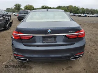 2016 BMW 7 Series 750i with VIN WBA7F0C54GGL99661, listed as a Copart auction lot 71742154 with 104,498 mi miles and Salvage Title. Bid and sale history available at carsss.com. Image 6.