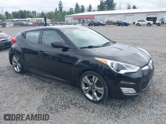2012 Hyundai Veloster w/Gray Int with VIN KMHTC6AD4CU062034, listed as a IAAI auction lot 42371790 with 116,861 mi miles and . Bid and sale history available at DreamBid. Image 1.