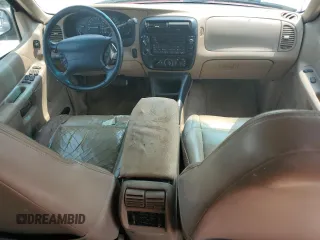2000 Ford Explorer XLT with VIN 1FMZU73E4YZA72348, listed as a Copart auction lot 59015585 with 182,606 mi miles and Salvage title. Bid and sale history available at DreamBid. Image 8.