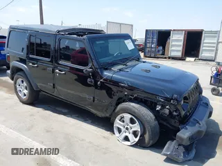 2023 Jeep Wrangler Willys z VIN 1C4HJXDG5PW615358, wystawiony jako IAAI lot #42383749 z przebiegiem 31 988 mil mil oraz . Historia ofert i sprzedaży dostępna na DreamBid. Obrazek 1.