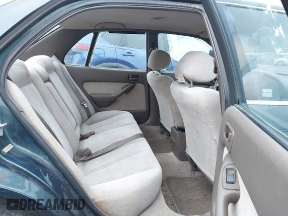 1996 Toyota Camry DX with VIN JT2BG12K5T0346311, listed as a IAAI auction lot 42130482 with 214,872 mi miles. Bid and sale history available at carsss.com. Image 8.