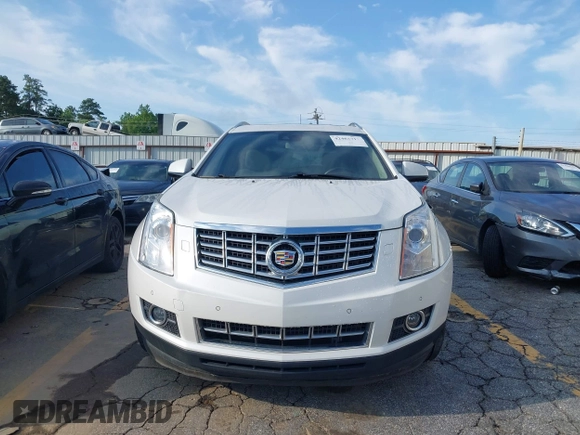2013 Cadillac SRX Premium Collection with VIN 3GYFNJE33DS625036, listed as a IAAI auction lot 42464711 with 83,344 mi miles and . Bid and sale history available at DreamBid. Image 13.