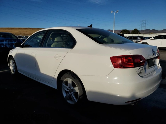 2014 Volkswagen Jetta TDI w/Premium with VIN 3VW3L7AJ4EM390185, listed as a Copart auction lot 76391084 with 49,897 mi miles and Salvage title. Bid and sale history available at DreamBid. Image 2.