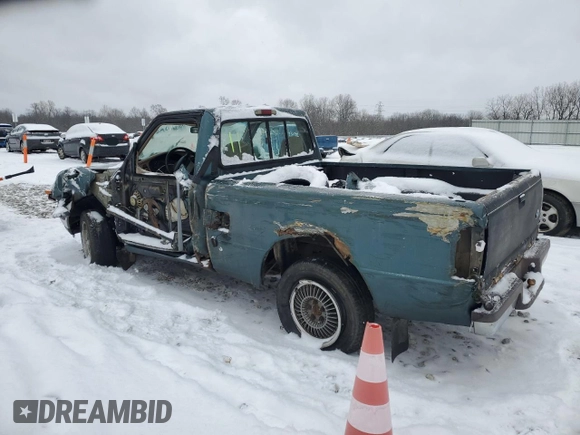 1997 Ford Ranger XLT with VIN 1FTCR10AXVUD48518, listed as a Copart auction lot 41518815 with 400,246 mi miles and Salvage title. Bid and sale history available at DreamBid. Image 2.