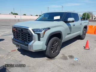 2022 Toyota Tundra Limited with VIN 5TFJA5AB6NX012246, listed as a IAAI auction lot 41868289 with 32,298 mi miles and . Bid and sale history available at DreamBid. Image 2.