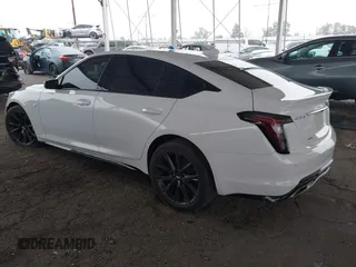 2021 Cadillac CT5 Sport z VIN 1G6DU5RK9M0117981, wystawiony jako IAAI lot #42021432 z przebiegiem 67 363 mil mil oraz . Historia ofert i sprzedaży dostępna na DreamBid. Obrazek 3.