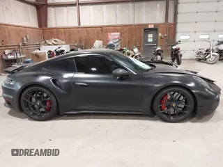 2024 Porsche 911 Turbo z VIN WP0AD2A96RS252418, wystawiony jako IAAI lot #42309087 z przebiegiem 21 824 mil mil oraz . Historia ofert i sprzedaży dostępna na DreamBid. Obrazek 13.