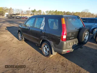 2004 Honda CR-V LX with VIN SHSRD784X4U207801, listed as a IAAI auction lot 41882897 with 246,541 mi miles and . Bid and sale history available at carsss.com. Image 3.