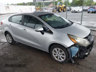 2013 Kia Rio LX z VIN KNADM4A38D6267151, wystawiony jako IAAI lot #42254156 z przebiegiem 148 760 mil mil oraz . Historia ofert i sprzedaży dostępna na DreamBid. Obrazek 1.