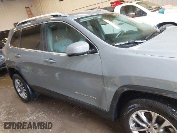 2021 Jeep Cherokee Latitude Lux with VIN 1C4PJMMX0MD214608, listed as a IAAI auction lot 41452997 with 31,441 mi miles and . Bid and sale history available at DreamBid. Image 13.