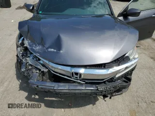 2016 Honda Accord Sport z VIN 1HGCR2F53GA184969, wystawiony jako Copart lot #64504045 z przebiegiem 165 146 mil mil oraz Szkoda całkowita • Salvage title. Historia ofert i sprzedaży dostępna na DreamBid. Obrazek 11.