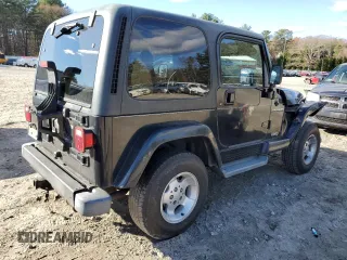 2002 Jeep Wrangler Sahara with VIN 1J4FA59S42P726814, listed as a Copart auction lot 80045514 with 197,196 mi miles and Clean Title. Bid and sale history available at carsss.com. Image 3.