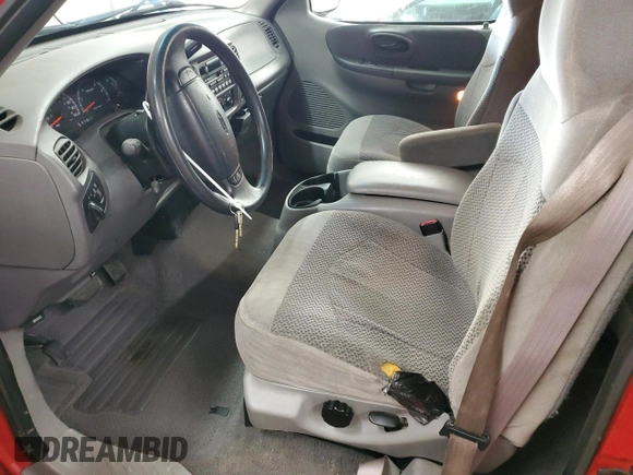 1999 Ford F-150 XL z VIN 1FTRX08L3XKB78940, wystawiony jako Copart lot #86010724 z przebiegiem 183 905 mil mil oraz Szkoda całkowita • Salvage title. Historia ofert i sprzedaży dostępna na DreamBid. Obrazek 7.