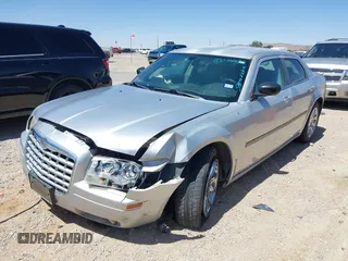 2007 Chrysler 300 with VIN 2C3KA43RX7H664582, listed as a IAAI auction lot 42106297 with 141,866 mi miles and . Bid and sale history available at DreamBid. Image 2.