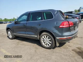 2015 Volkswagen Touareg Lux с VIN WVGEP9BP6FD003059, выставлен на аукционе Copart как лот 59670505 с пробегом 162 945 миль миль и Списание • Salvage title. История ставок и продаж доступна на DreamBid. Изображение 2.