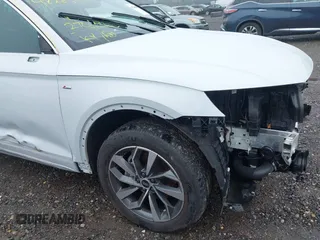 2023 Audi Q5 S line Premium Plus z VIN WA1EAAFY9P2089095, wystawiony jako IAAI lot #42263035 z przebiegiem 10 279 mil mil oraz . Historia ofert i sprzedaży dostępna na DreamBid. Obrazek 18.