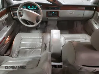 1994 Cadillac DeVille z VIN 1G6KD52B7RU290139, wystawiony jako Copart lot #46899465 z przebiegiem 133 110 mil mil oraz Czysty tytuł • Clean title. Historia ofert i sprzedaży dostępna na DreamBid. Obrazek 8.