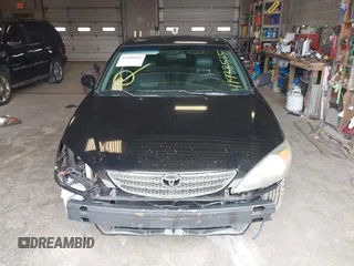 2003 Toyota Camry LE with VIN 4T1BE32K33U171859, listed as a IAAI auction lot 41938515 with 213,447 mi miles and . Bid and sale history available at DreamBid. Image 13.