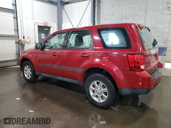 2011 Mazda Tribute Touring with VIN 4F2CY0C71BKM06780, listed as a Copart auction lot 77748114 with 144,163 mi miles and Salvage Title. Bid and sale history available at carsss.com. Image 2.