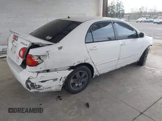 2003 Toyota Corolla CE with VIN 1NXBR32E13Z035938, listed as a IAAI auction lot 41892043 with 236,708 mi miles and . Bid and sale history available at DreamBid. Image 4.