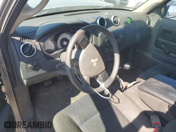 2006 Mitsubishi Raider LS z VIN 1Z7HC22K06S581912, wystawiony jako Copart lot #70500254 z przebiegiem 137 038 mil mil oraz Szkoda całkowita • Salvage title. Historia ofert i sprzedaży dostępna na DreamBid. Obrazek 8.
