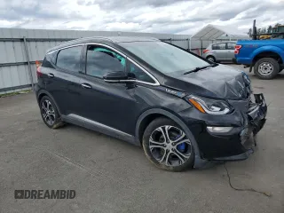 2018 Chevrolet Bolt EV Premier with VIN 1G1FX6S09J4122445, listed as a Copart auction lot 55230635 with 33,569 mi miles and Salvage title. Bid and sale history available at DreamBid. Image 4.