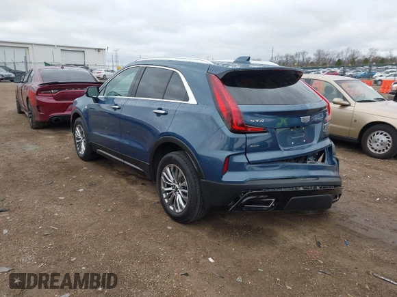 2024 Cadillac XT4 AWD Premium Luxury with VIN 1GYFZDR45RF143981, listed as a IAAI auction lot 42032787 with 14,700 mi miles and . Bid and sale history available at DreamBid. Image 3.