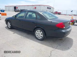 2003 Ford Taurus SE Standard with VIN 1FAFP53U13A102879, listed as a IAAI auction lot 42335795 with 193,023 mi miles and . Bid and sale history available at DreamBid. Image 3.