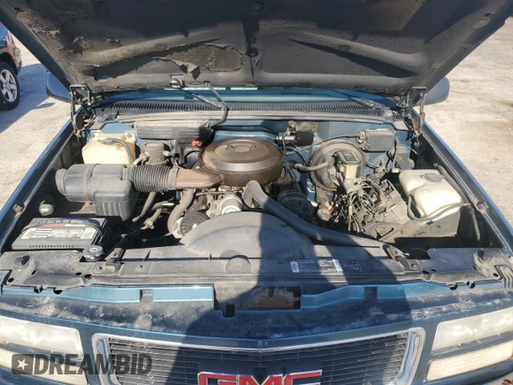 1994 GMC Suburban z VIN 1GKFK16K4RJ754534, wystawiony jako Copart lot #56044145 z przebiegiem 224 747 mil mil oraz Nie do naprawy • Non repairable. Historia ofert i sprzedaży dostępna na DreamBid. Obrazek 11.