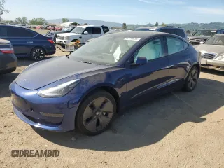 2023 Tesla Model 3 with VIN 5YJ3E1EA5PF547556, listed as a Copart auction lot 52799655 with 5,242 mi miles and Salvage title. Bid and sale history available at DreamBid. Image 1.
