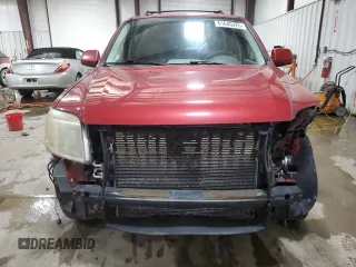 2008 Mercury Mariner Premier z VIN 4M2CU97118KJ52951, wystawiony jako Copart lot #61640225 z przebiegiem 186 109 mil mil oraz Szkoda całkowita • Salvage title. Historia ofert i sprzedaży dostępna na DreamBid. Obrazek 5.