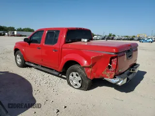 2006 Nissan Frontier LE with VIN 1N6AD07W66C406128, listed as a Copart auction lot 56281695 with 97,777 mi miles and Salvage title. Bid and sale history available at DreamBid. Image 2.
