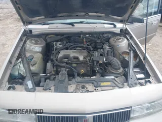 1996 Oldsmobile Cutlass Ciera 1SA VX5 z VIN 1G3AJ55MXT6328733, wystawiony jako IAAI lot #41972783 z przebiegiem 182 525 mil mil oraz . Historia ofert i sprzedaży dostępna na DreamBid. Obrazek 10.